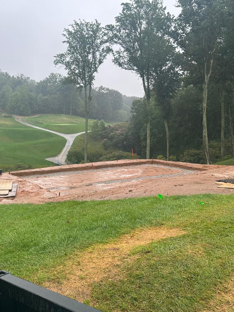 Volunteer renovation support at Caves Valley tee area